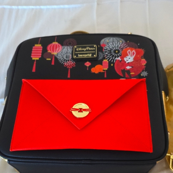 Loungefly Handbags - Loungefly Black and Red Backpack with Playful Design